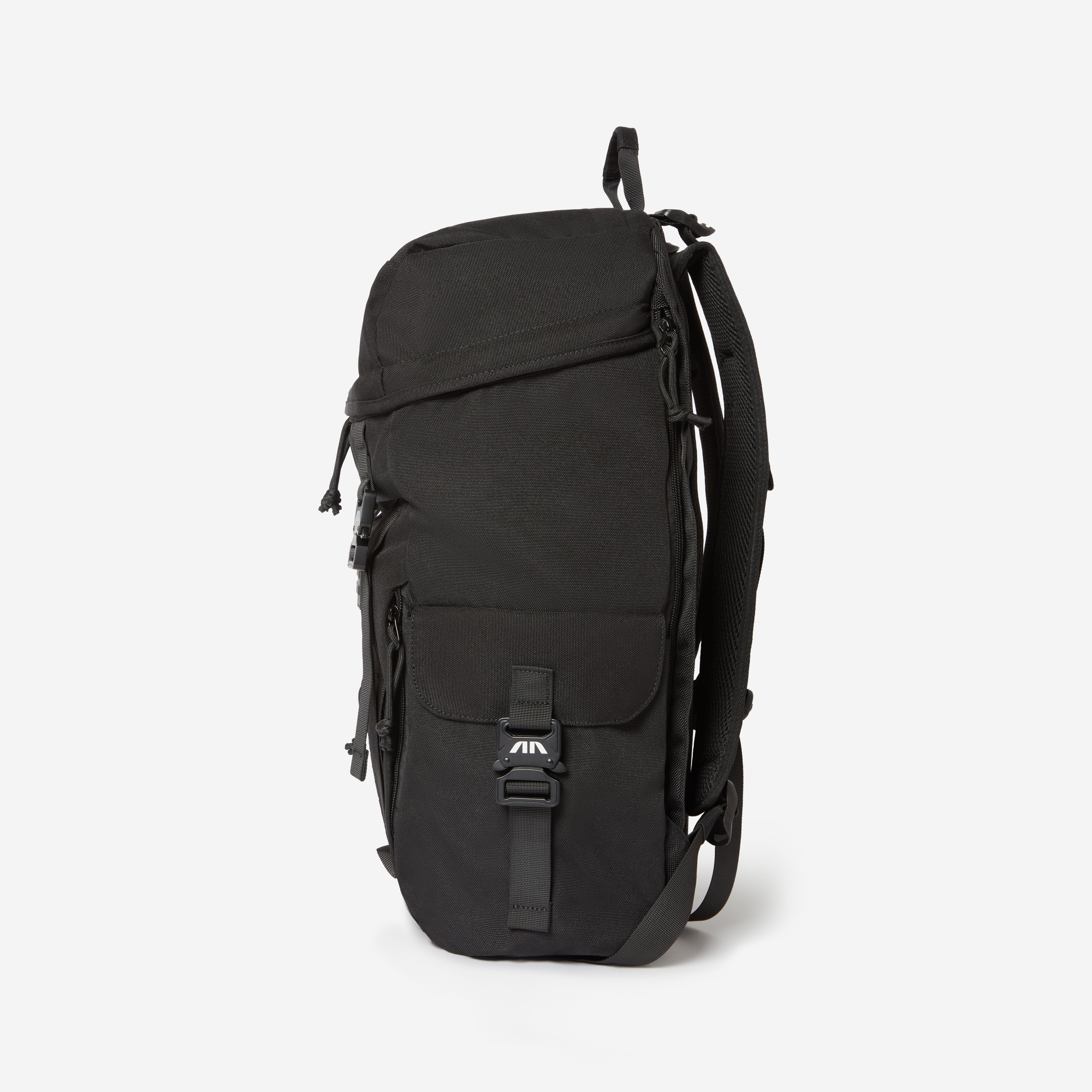 Side detail showing secure buckle pocket for valuables—streamlined and functional for everyday carry.